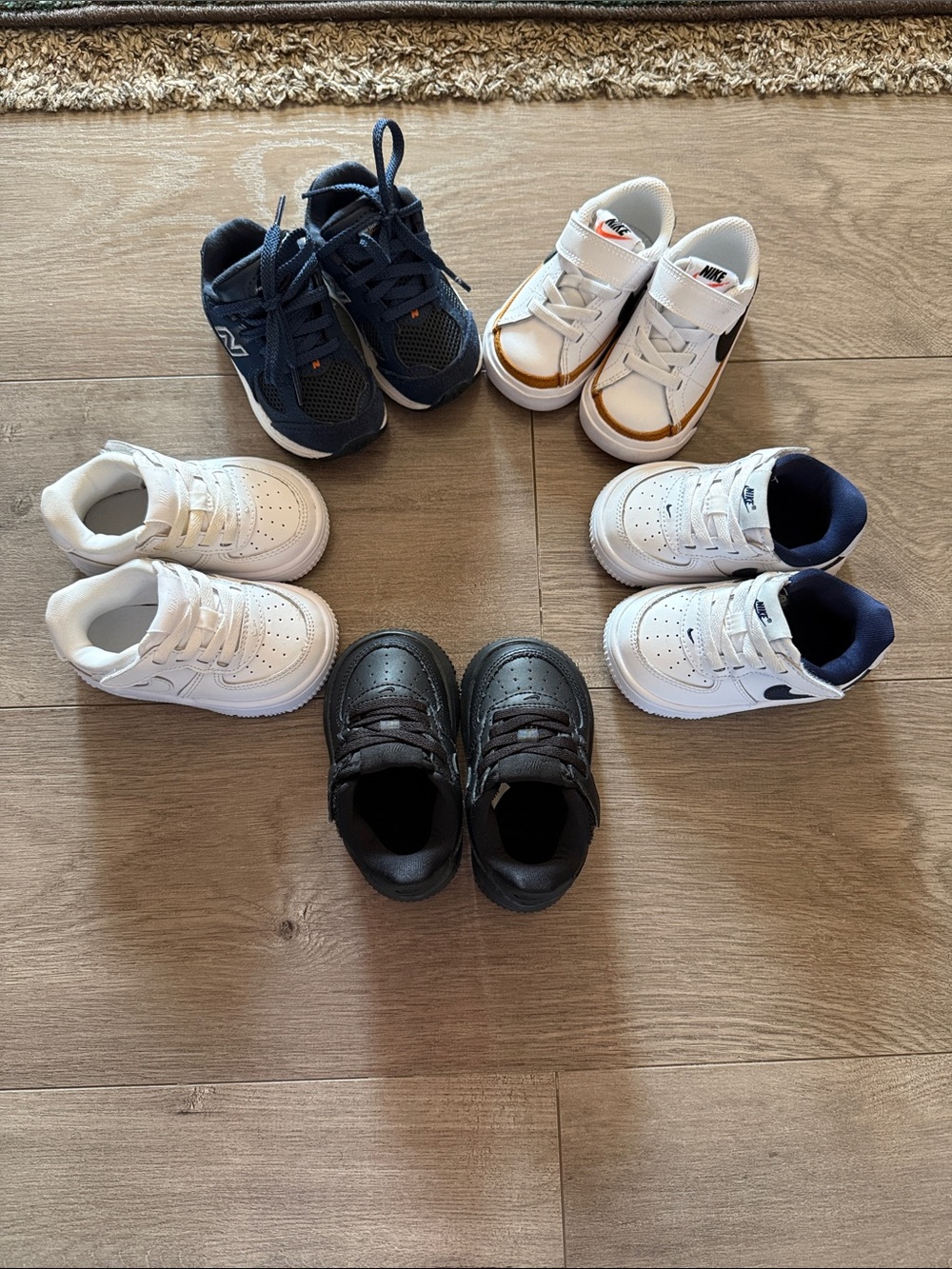 Infant Sneakers, size 4, Nike (4pair) and New Balance(1 pair)